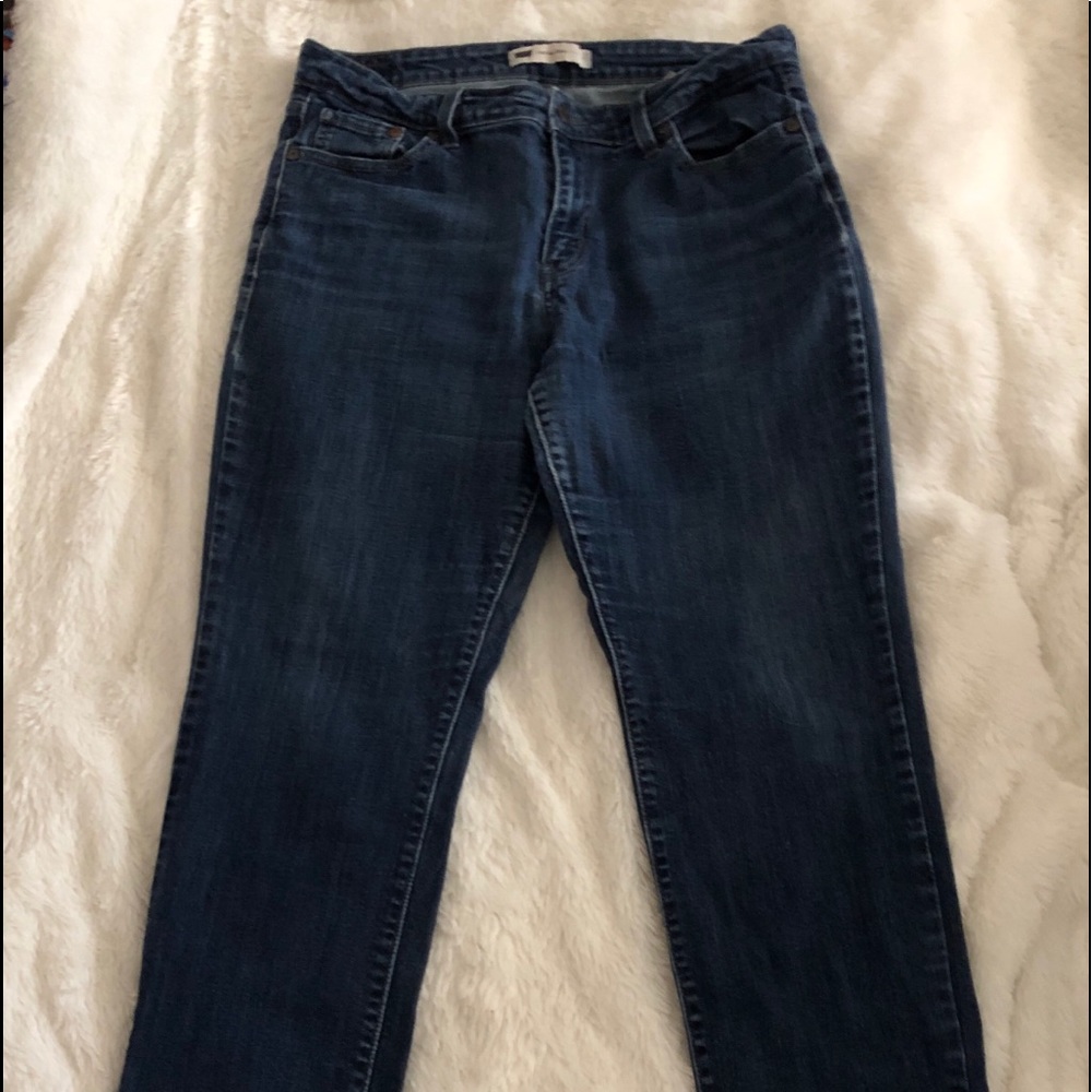 Levi’s mid-rise skinny jeans, dark wash